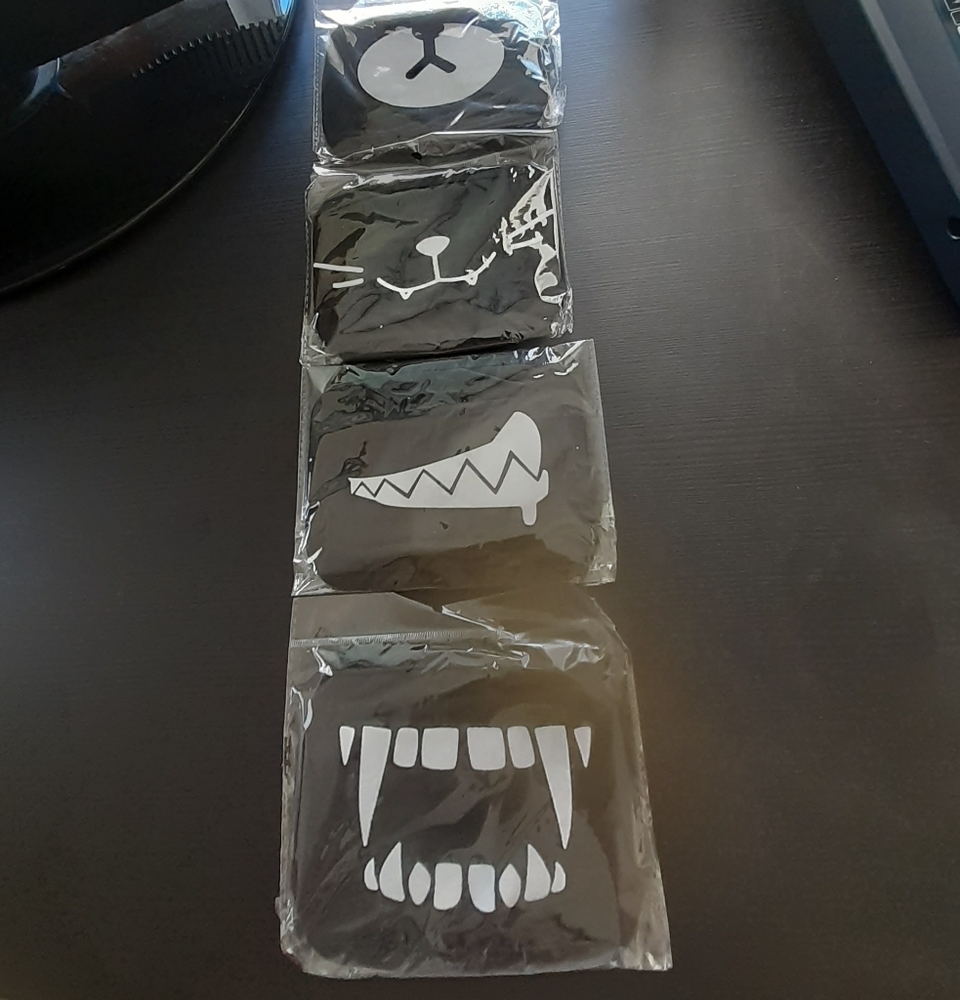 Lot of 4 Dust Masks w/ Cartoon faces. Reusable!